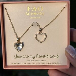 N38. FAO SCHWARZ FINE SILVER PLAYED CZ HEART NECKLACE BOX SET